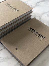 A relationship journal with a minimalist, neutral-toned cover design. The journal features lined pages for recording thoughts and reflections.