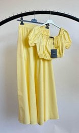 "Women's suit yellow pink off-white taupe long flowing dress elegant minimalist style"