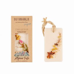 Scented pendant made of Swiss pine with floral design, suitable for room fragrance.