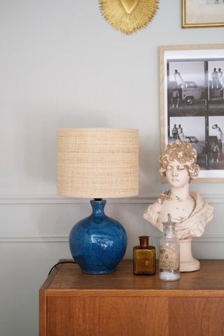 Deep Ocean Blue ceramic table lamp with Raffia -rattan Fabric Shade, unique color design, statement lamp. Very elegant.