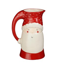  A red and white ceramic pitcher with a polka dot pattern and a smiling face design. The pitcher appears to be made of earthenware and is suitable for holding water or other liquids.
