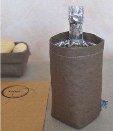 Cylindrical brown storage jar with a glass lid, suitable for storing ice wine or other beverages.