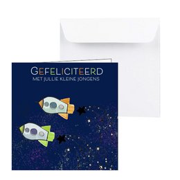 Greeting card with twin baby boy rocket ships in space design. Navy blue background with stars and planets. Suitable for birth announcement or baby shower.