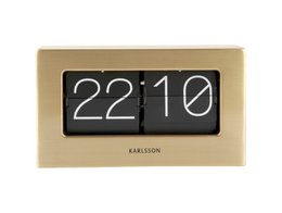  A boxed flip-style table clock with a black and white digital display showing the time as 22:10.