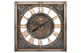  Large silver-toned wall clock with intricate gears and Roman numerals.
