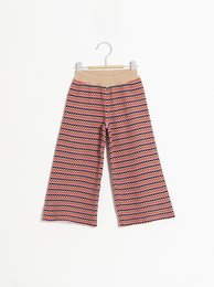 Kids' striped shorts in red and white, suitable for ages 2-10 years.