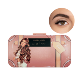 The image shows a pink and gold makeup product called "Lisa Marie Schiffner Empire" which appears to be an eye makeup product. The product is displayed on a pink background with other makeup items. Based on the image, the relevant description for this product could be:

"Elegant pink and gold eye makeup product with a glamorous, curled lash design. Features a sleek, modern packaging style."