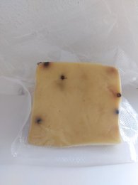 Pecorino cheese from Sicily, made with black pepper, weighing 250 grams.