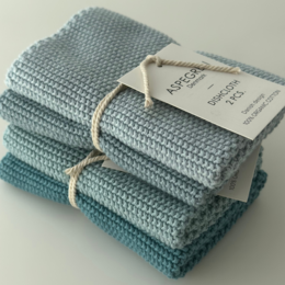  Knitted dishcloths in a solid aqua color, made of absorbent and durable material.