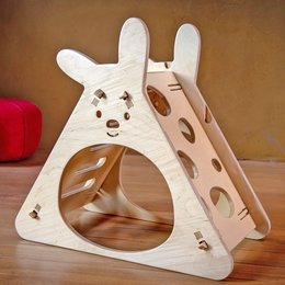 Wooden rabbit-shaped toy with slide for developing motor skills, suitable for children.