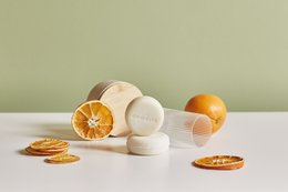 Orange soap bars in a gift set, made with natural ingredients.