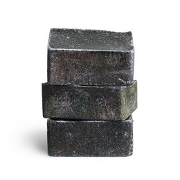  Black, rectangular fragrance cubes made of amber-colored material with a musk scent.