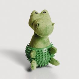  Green plush dinosaur toy with squeaker. Soft, textured toy for dogs to play with.