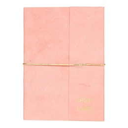 A6 sized notebook with "Enjoy today" text printed on the cover, made of pink paper material.