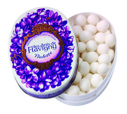 Anis de Flavigny - Anise Pastilles with Violets, a tin of violet-flavored anise candies in a round tin with a floral design.