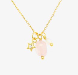  "Rose quartz necklace with sterling silver chain and gold-tone charms including stars. Elegant and feminine jewelry piece."

The product is a rose quartz necklace with a sterling silver chain. The necklace features gold-tone charms, including stars. This elegant and feminine jewelry piece would be suitable for a variety of occasions.