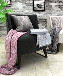A modern, stylish throw blanket available in various color combinations including skyblue & grey, pink & beige, and dark grey beige. The throw measures 140 x 200 cms and features a premium design.