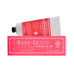 Honeysuckle-scented hand cream in a pink tube. Moisturizing formula with natural ingredients.