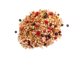 A large pile of granola with various berries, nuts, and dried fruit. The granola appears to be a mix of oats, nuts, seeds, and dried berries. The colors include golden brown, red, and dark purple.