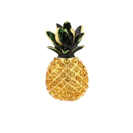 Yellow gold pineapple brooch with black crown top, textured fruit design, tropical fruit shape pin.