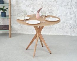 Round dining table in natural ash wood veneer, available in 70cm, 80cm, and 90cm sizes. Also available in oak, walnut, black, and white stained finishes.