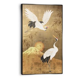  This framed artwork depicts two elegant cranes or Kraanvogels in a natural landscape setting. The cranes have striking white plumage with black accents, and are set against a warm, earthy background. The artwork has a classic, Japanese-inspired aesthetic.