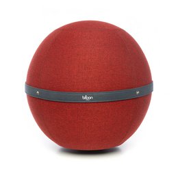  A round, red upholstered ottoman or pouf with a dark band around the middle, placed in a modern living room setting with a wooden table and chairs.