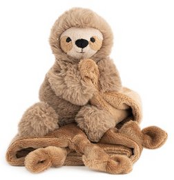  A soft, plush cuddle cloth in the shape of a brown sloth. The sloth has a round, friendly face and a cozy, huggable body.