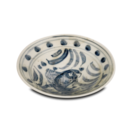 Decorative blue and white ceramic bowl with a fish design.