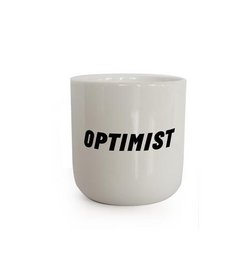 A white ceramic mug with the text "OPTIMIST" printed in black.