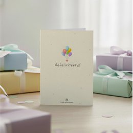  Cream colored birthday greeting card with colorful balloons and "Gefeliciteerd" text, festive celebration design.
