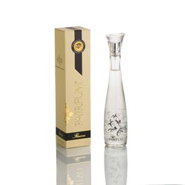 Linen spray in a clear glass bottle with a floral design. The bottle is packaged in a beige box with a gold seal. The spray is designed to fragrance towels, sheets, and other fabrics with scents like blush rose & amber, linen & lavender, and magnolias in bloom.