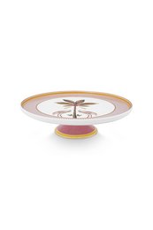 A round pink cake stand with a decorative floral design in the center.
