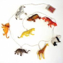 String lights with safari animal-shaped lights, including a zebra, giraffe, elephant, and other jungle animals. Ideal for decorating a child's room or nursery.