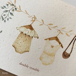 A greeting card featuring two whimsical, illustrated girls with a playful, nature-inspired design. The card is titled "double trouble girls" and appears to be suitable for a birthday celebration.