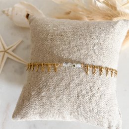 A stylish black, white, and gold zebra-patterned bracelet made of chain links. The bracelet features a unique and eye-catching design that would complement a variety of casual or formal outfits.