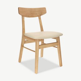  Wooden dining chair with ivory PU leather seat. Curved backrest, solid wood frame.