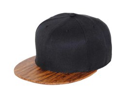 Black baseball cap with wooden zebrano brim and midnight black crown.