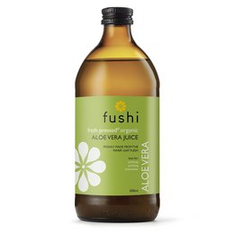 Aloe vera juice, 500 ml bottle, green label with flower design, natural and healthy drink.