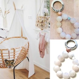 Rose quartz crystal, natural stone, suitable for babies and children, soft pastel colors, round shape, heart charm.