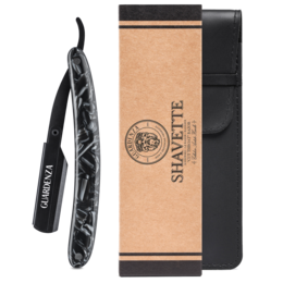  A black straight razor with a textured handle, packaged in a brown cardboard box. The razor is designed for close, precise shaving and has a classic barbershop aesthetic.