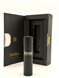  Refillable travel perfume in a sleek black container, perfect for on-the-go fragrance needs. Includes a 8 ml bottle.