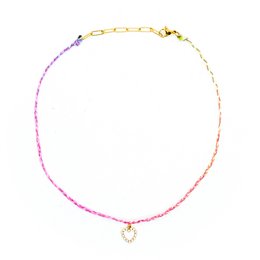 Colorful beaded necklace with a surfer pendant, available in various gradient color combinations.