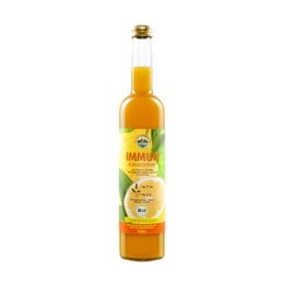 This product is an IMMUN concentrate savings package, a superfood item. The image shows a bottle of the IMMUN concentrate along with some ingredients like ginger, lemon, and other citrus fruits. The description for this product could be: "Organic IMMUN concentrate with ginger, lemon, and citrus flavors. Superfood supplement for immune support."