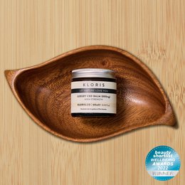 High Strength CBD Balm, a 60ml or 30ml cream product containing 800mg or 400mg of CBD respectively. The balm is presented in a wooden dish, with a natural, earthy aesthetic.