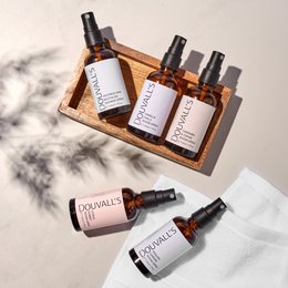 Natural room spray with 4 scent options - citrus sorbet, cannabis & cedar, english garden, and vanilla chili. Packaged in amber glass bottles.