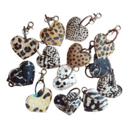  Leather heart-shaped keychains with animal print patterns, including leopard, cheetah, and other animal-inspired designs.