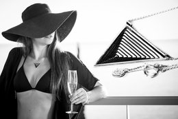 Triangular pendant necklace with geometric design, available in silver, oxidized, and gold-plated finishes.