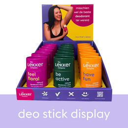  Deodorant stick display featuring colorful deodorant sticks in a variety of scents and styles. The display showcases the product's benefits such as being natural, active, and fun.