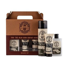 A shaving gift set containing a 395ml bottle, featuring a classic masculine design and branding. The set includes essential shaving products for the man who knows how.